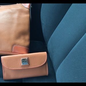 Dooney and bourke purse and clutch. New with tags